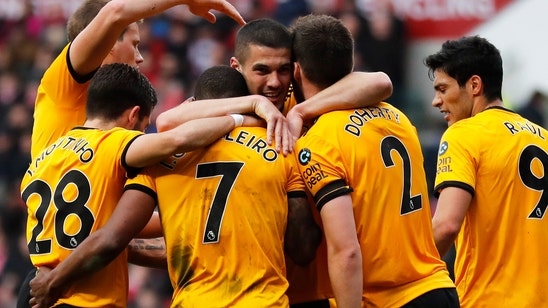 Wolverhampton hangs on to beat Bristol City in FA Cup