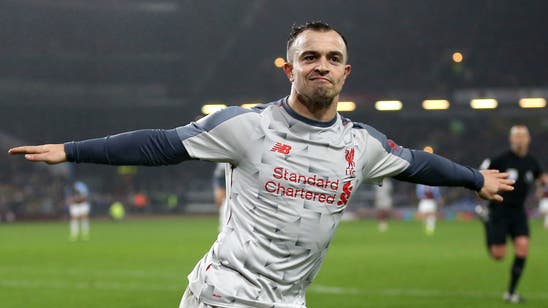 Liverpool beats Burnley 3-1 to stay on Man City’s coat tails
