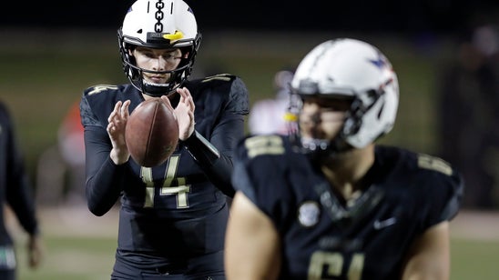 Vandy keeps bowl hopes alive, edging Ole Miss 36-29 in OT