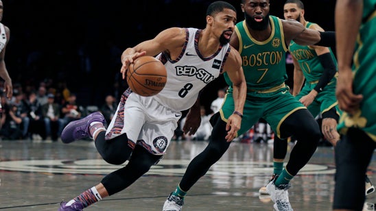 Dinwiddie has 32, Nets beat Celtics as Irving sits again