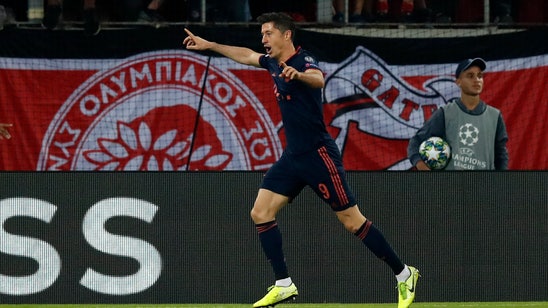 Lewandowski scores 2 as Bayern beats Olympiakos 3-2