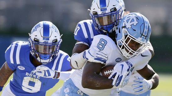 Duke holds off rival UNC 42-35 to keep Victory Bell