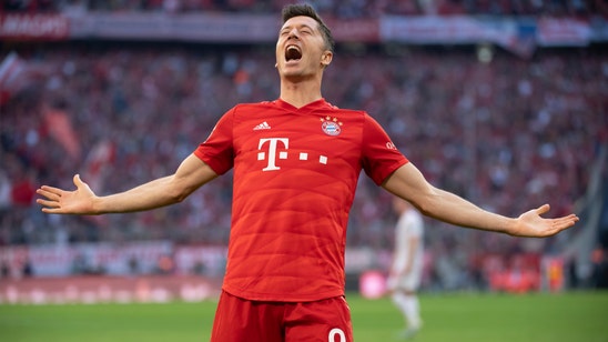 Lewandowski record as Bayern moves top in Bundesliga