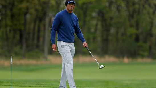 The Latest: Tiger back at Bethpage, ready to go