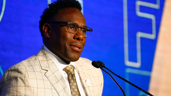 The Latest: Malzahn says top camp priority is starting QB