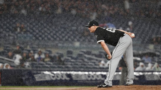 Jimenez hits 1st 2 HRs, ChiSox top Yanks in soggy 6+ innings
