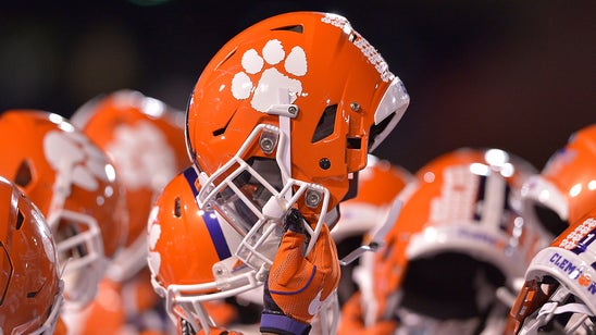 Clemson fan wears jersey declaring Tigers national champions to CFP title game