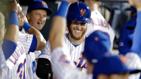 Wheeler homers, strikes out 11 as Mets rout Phillies 9-0