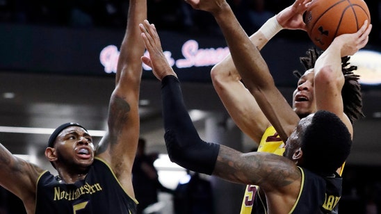 Coffey scores 32, leads Minnesota over Northwestern 62-50