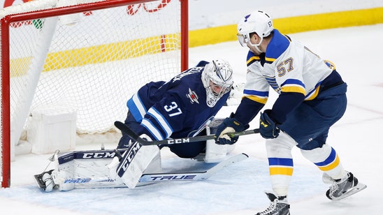 Perron scores in OT; Blues win 7th straight, 5-4 over Jets