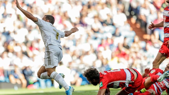 Hazard scores 1st league goal as Madrid beats Granada 4-2