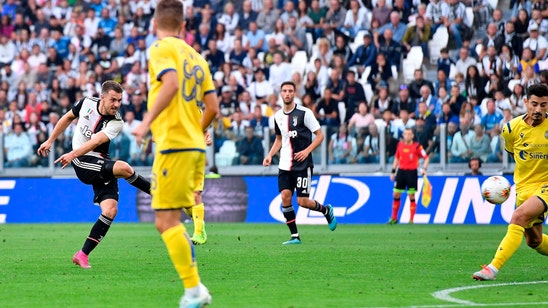 Ramsey and Buffon help Juventus beat Verona 2-1