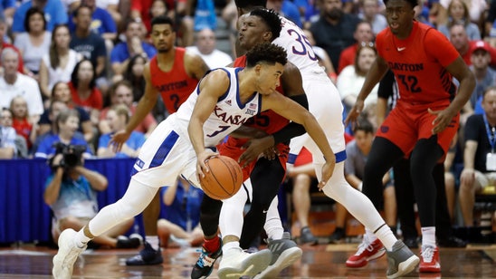 No. 4 Kansas beats Dayton 90-84 in overtime for Maui title