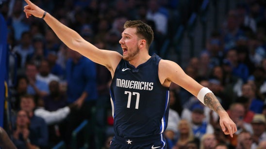 Late charge calls, Doncic's 27 help Mavs top Magic 107-106