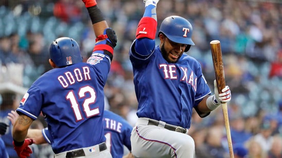 Minor strikes out 13 as Rangers pound Mariners 15-1