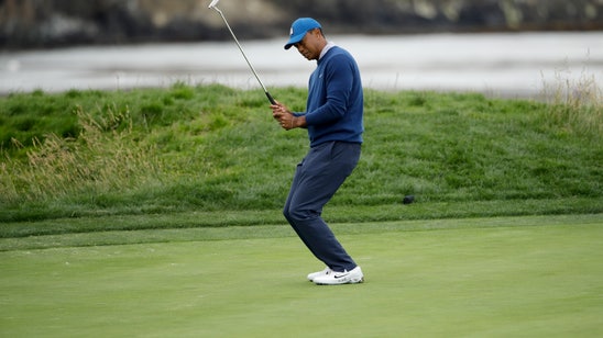 The Latest: Woodland takes lead into final round of US Open