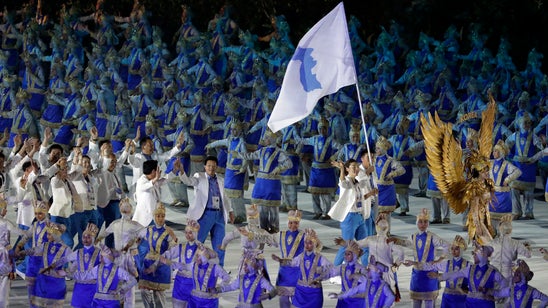 Combined Koreas crew wins historic medal at Asian Games