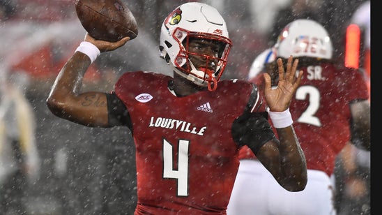 Louisville earns 31-7 rain-soaked win over Indiana State