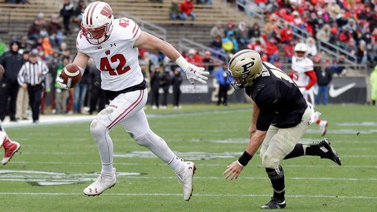 Badgers rebound from slow start to blow out Purdue, 49-20