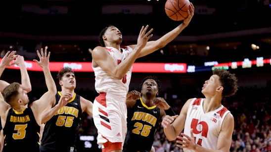 Late comeback lifts struggling Huskers past Iowa 93-91 in OT