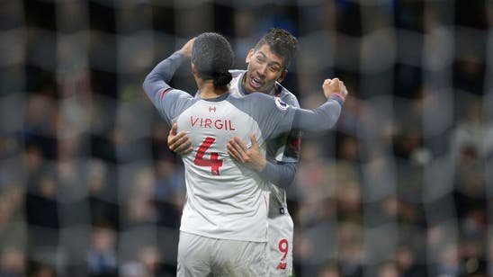 Title-chaser Liverpool comes from behind to sink Burnley