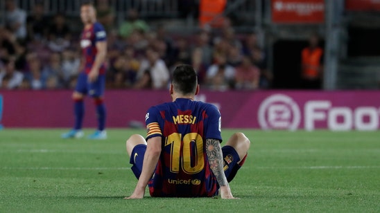 Messi hurt again as Barcelona beats Villarreal 2-1