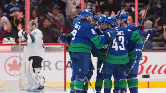 Pearson leads Canucks past Sharks and into 1st in Pacific