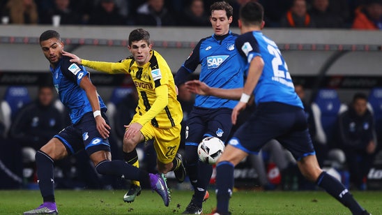 Hoffenheim remains unbeaten, draws 10-man Dortmund 2-2