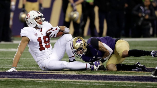 Washington holds off Stanford’s late rally, wins 27-23