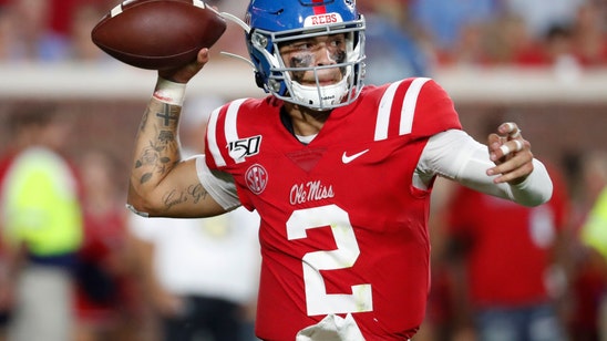 Corral leads Ole Miss past Arkansas 31-17 in an SEC opener