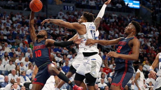 Crutcher's 3 in OT lifts No. 13 Dayton over Saint Louis