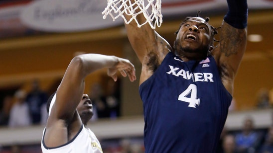 Jones leads No. 18 Xavier to 73-51 victory over Towson
