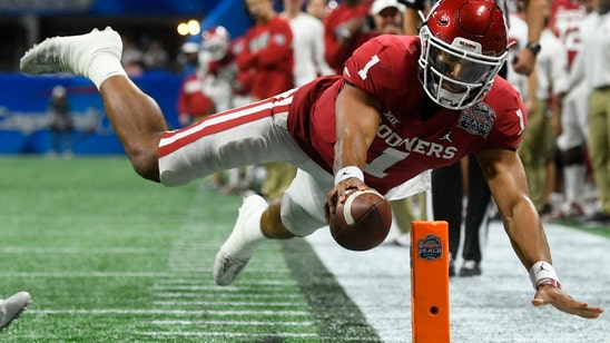 Jalen Hurts eyes NFL, with 'boulder' not chip on shoulder