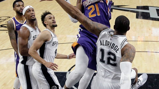 Forbes’ double-double sends Spurs past Suns 111-86