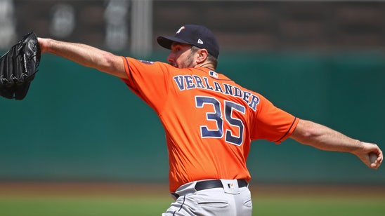 Verlander wins 200th, Astros back ahead of A’s with 9-4 win