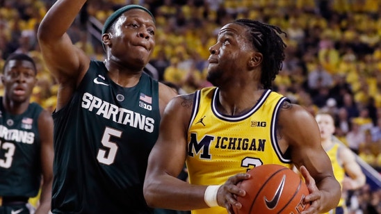No. 7 Michigan plays at No. 9 Michigan State for B10 title