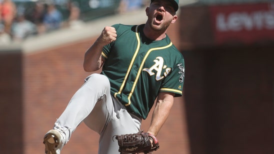 Chapman homers twice, Bailey strong as A's hold off Giants