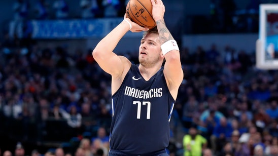 Doncic rolls with Nowitzki watching, Mavs rout Cavs 143-101