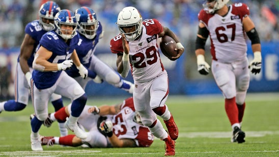 Edmonds runs for 3 TDs, Cards top Giants in Barkley's return