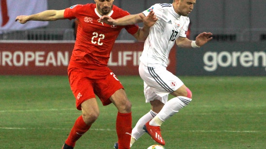 After playing with head injury, Schaer to miss Swiss game