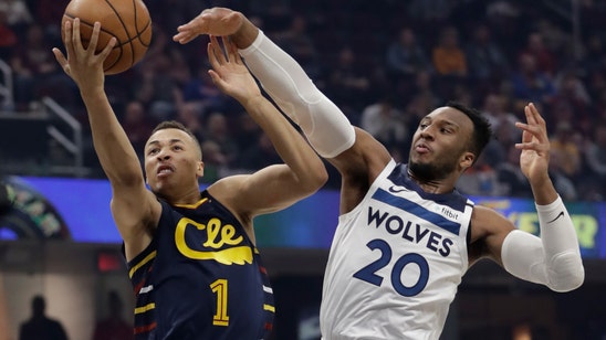 T-Wolves blow huge second-half lead, hold off Cavs 118-103