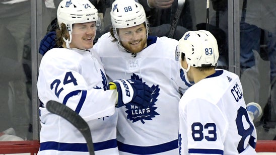 Devils score into own net, gifting Toronto a 5-4 OT win