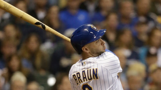 Aguilar’s 2-run double helps Brewers beat Giants 4-2