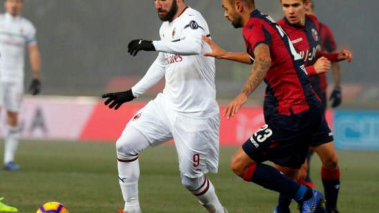 10-man AC Milan draws 0-0 at relegation-threatened Bologna