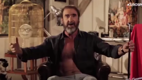 Watch a bare-chested Eric Cantona sing 'Will Grigg's On Fire'