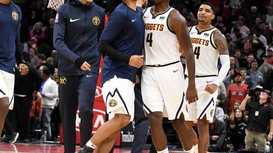 Millsap’s putback gives Nuggets 108-107 win over Bulls in OT
