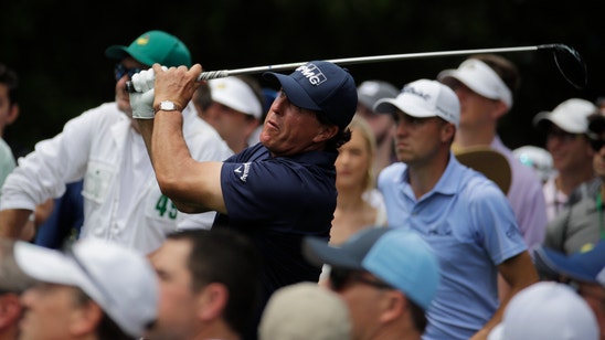 Tiger looms large, even on star-filled Masters leaderboard