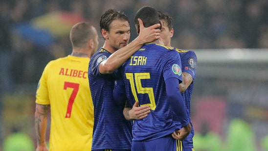 UEFA charges Romania with 'racist behavior'