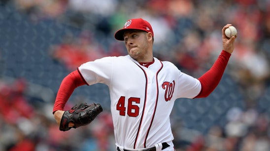 Corbin takes 1-hitter into 8th, Nationals beat Giants 4-2