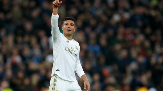 Casemiro scores 2 as Madrid beats Sevilla 2-1